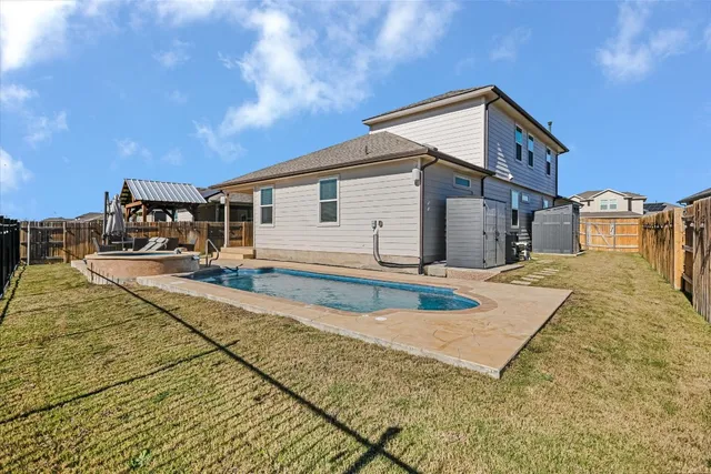 a view of a house with a patio