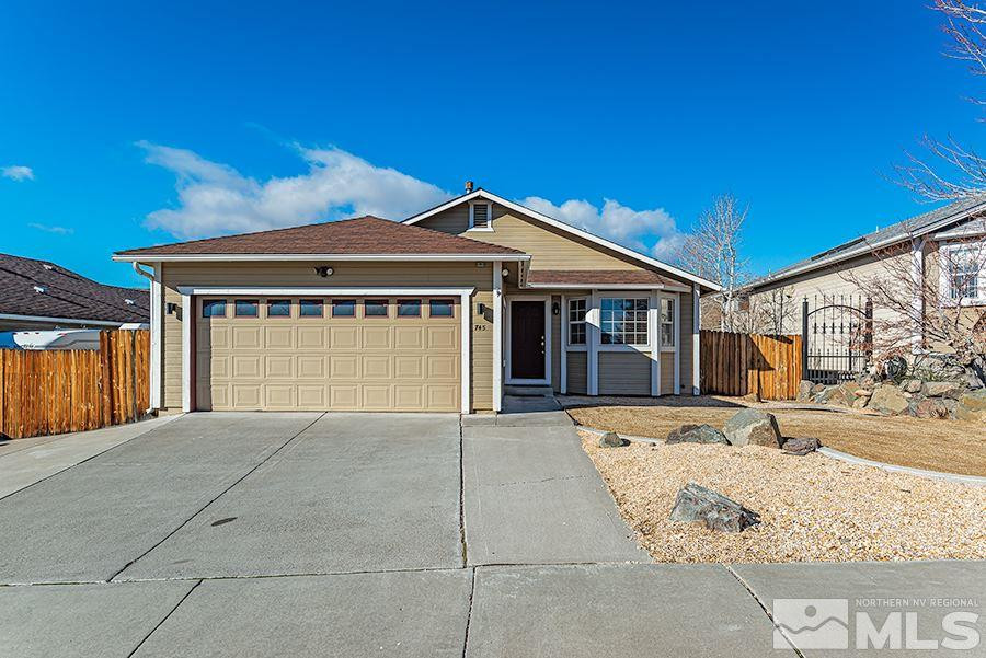 745 Talus Way Reno, NV 89503 - Photo 1 of 17 a front view of a house with a yard