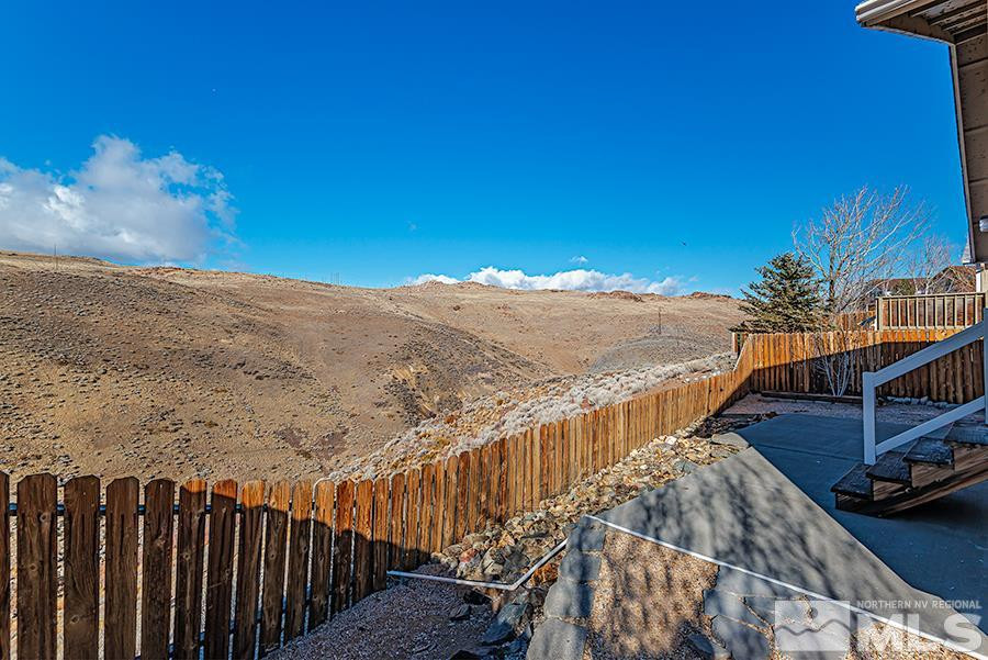 745 Talus Way Reno, NV 89503 - Photo 15 of 17 a view of balcony with wooden floor and lake view