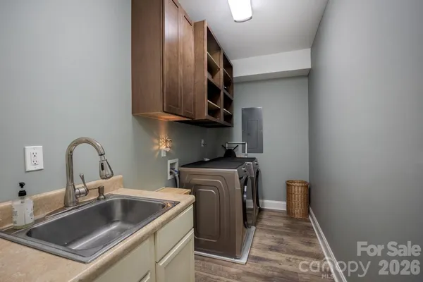 a kitchen with a stove and a sink
