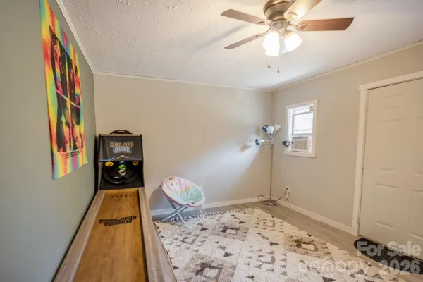 a house with trees in the background