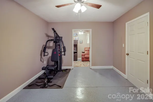 an aerial view of a house with outdoor space