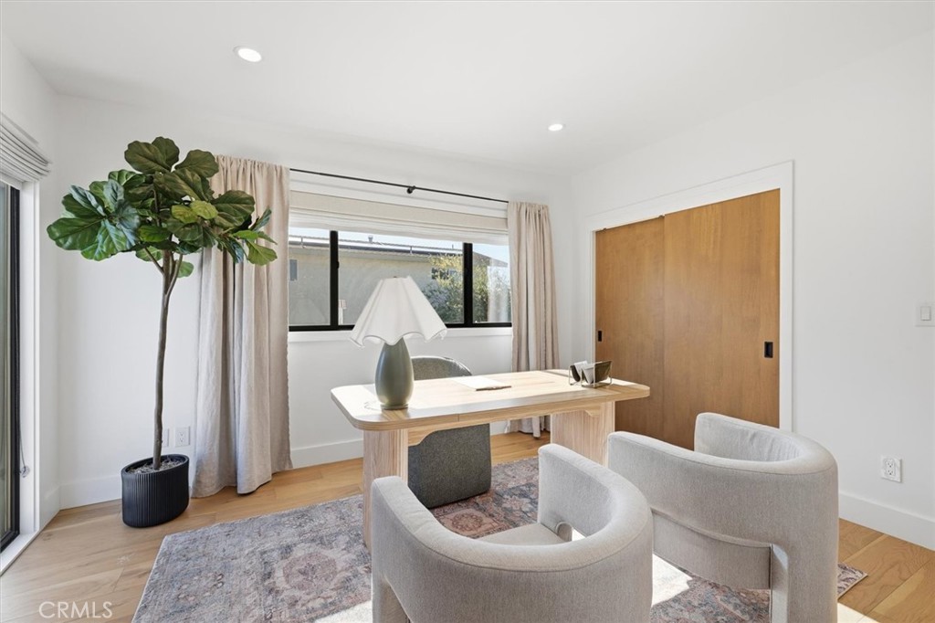 1909 Springfield Avenue Hermosa Beach, CA 90254 - Photo 19 of 31 a living room with furniture and a potted plant
