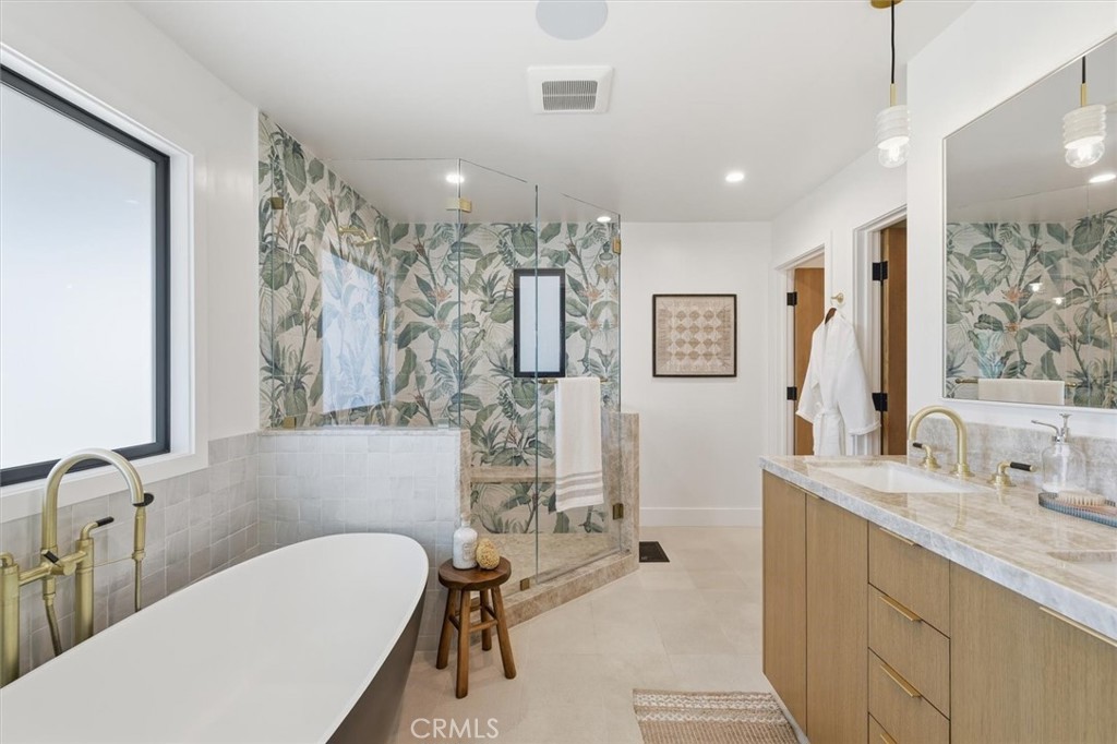1909 Springfield Avenue Hermosa Beach, CA 90254 - Photo 23 of 31 a bathroom with a sink mirror and a bathtub