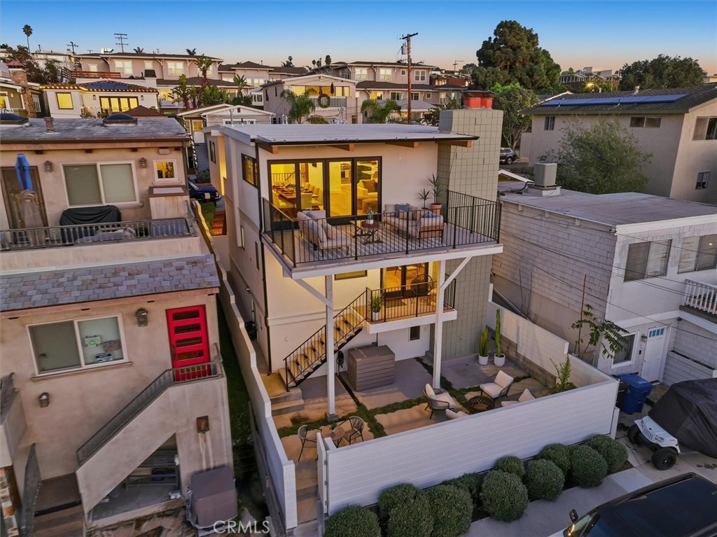 1909 Springfield Avenue Hermosa Beach, CA 90254 - Photo 29 of 31 a front view of a house with outdoor seating