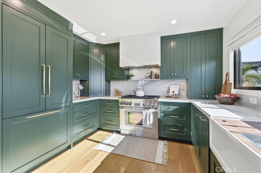 1909 Springfield Avenue Hermosa Beach, CA 90254 - Photo 9 of 31 a kitchen with a stove sink and cabinets