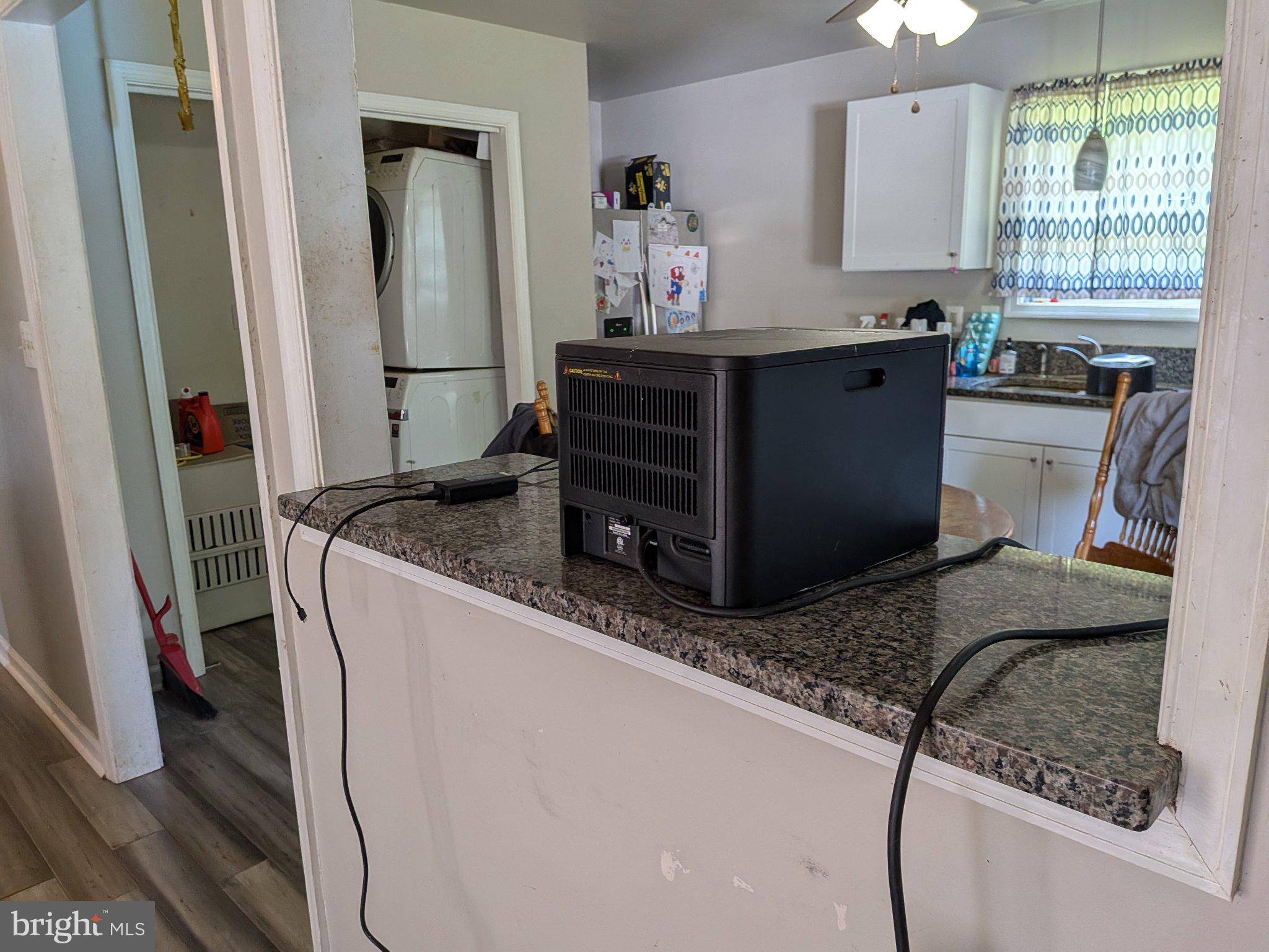 10198 Old Rapidan Road Orange, VA 22960 - Photo 21 of 29 Modern kitchen with sleek appliances.