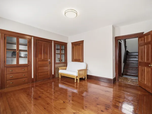a view of an empty room with a window