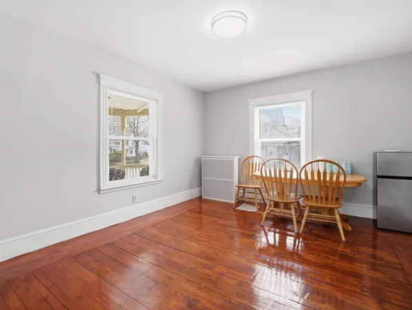 a view of livingroom with hardwood floor and window