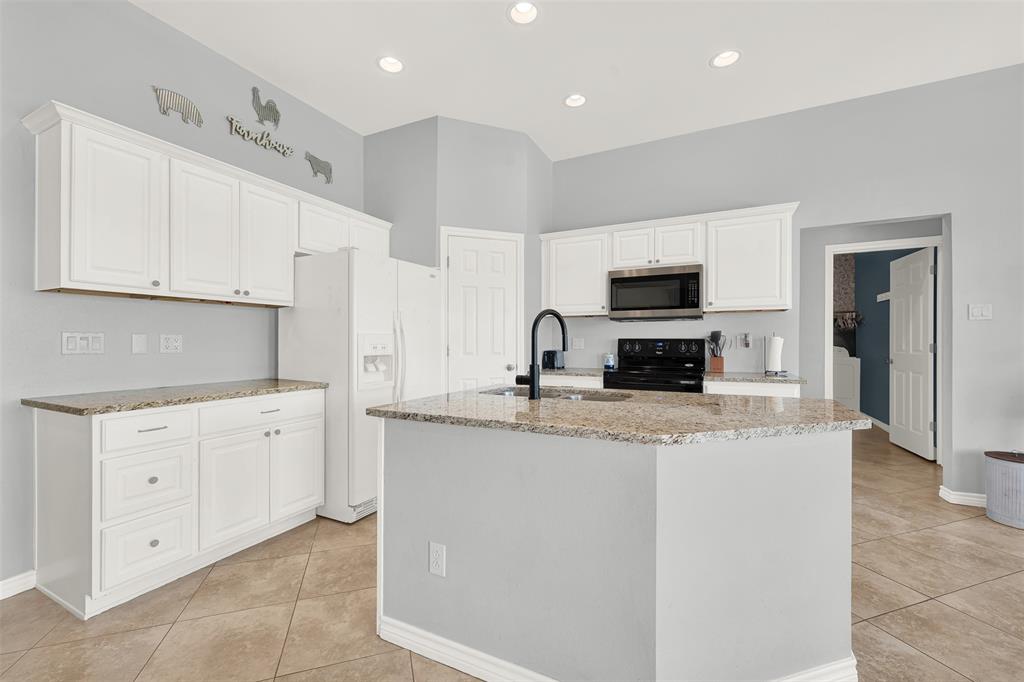 736 Audra Circle Rhome, TX 76078 - Photo 5 of 30 Island Kitchen