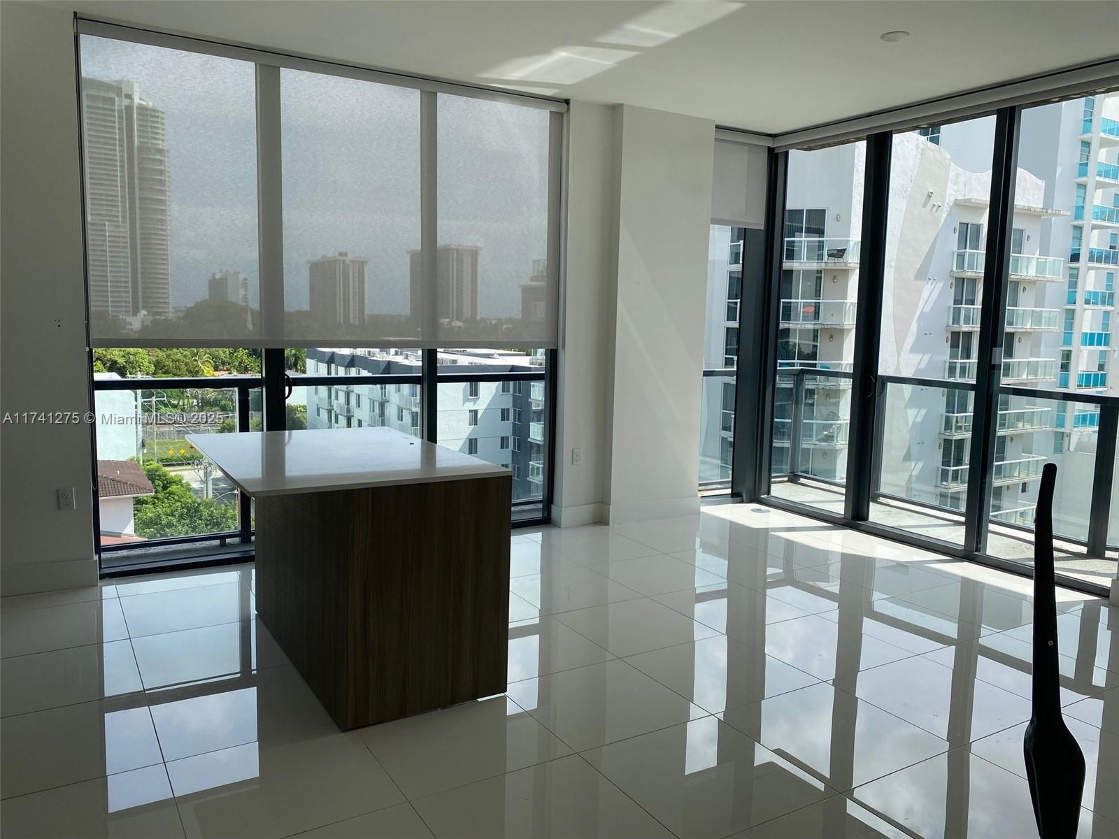 a view of a balcony with chairs