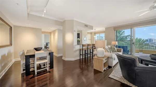 a bedroom with a bed and a flat screen television