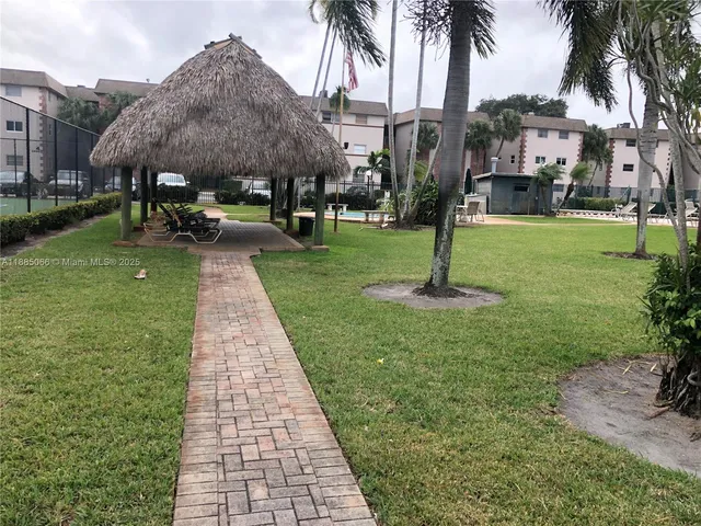 a view of a park with a fountain