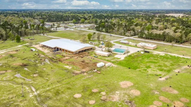 a view of an swimming pool and an outdoor seating