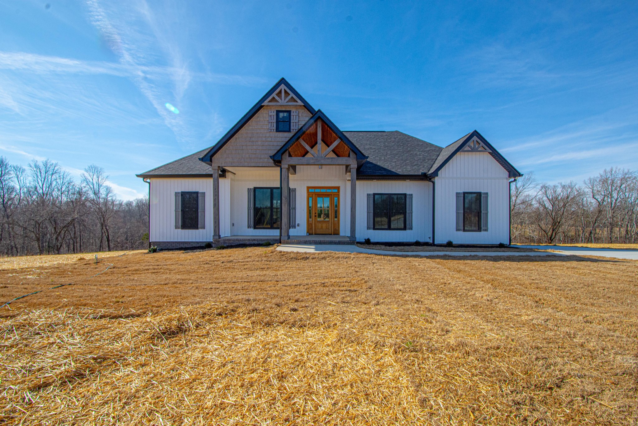 476 Chestnut Grove Road Pulaski, TN 38478 - Photo 1 of 55 a front view of a house with a garden