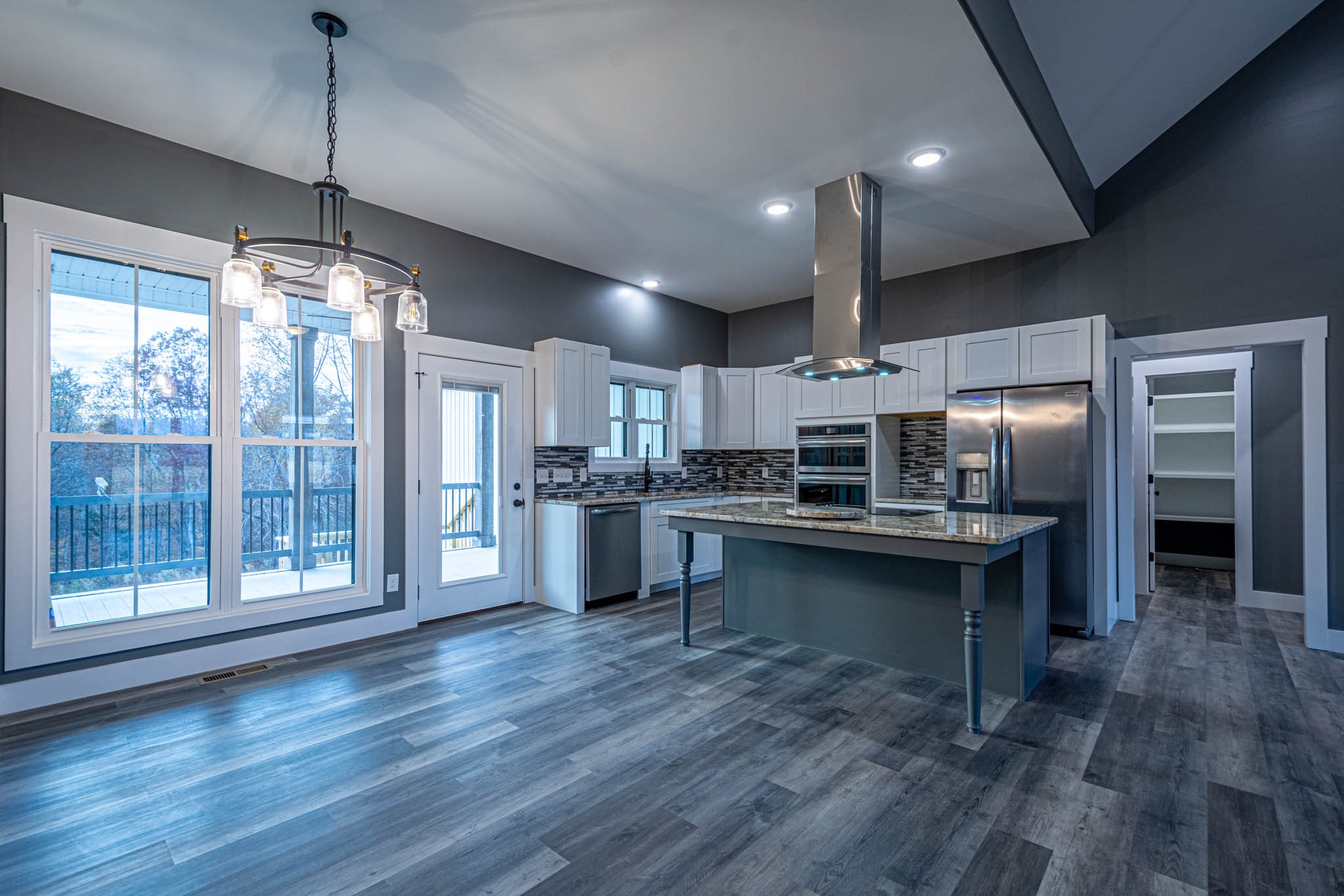 476 Chestnut Grove Road Pulaski, TN 38478 - Photo 17 of 55 a kitchen with kitchen island granite countertop a sink cabinets and stainless steel appliances