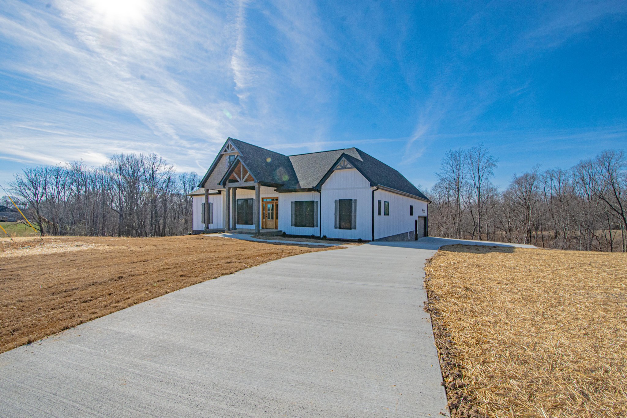 476 Chestnut Grove Road Pulaski, TN 38478 - Photo 2 of 55 a front view of house with yard and trees in the background