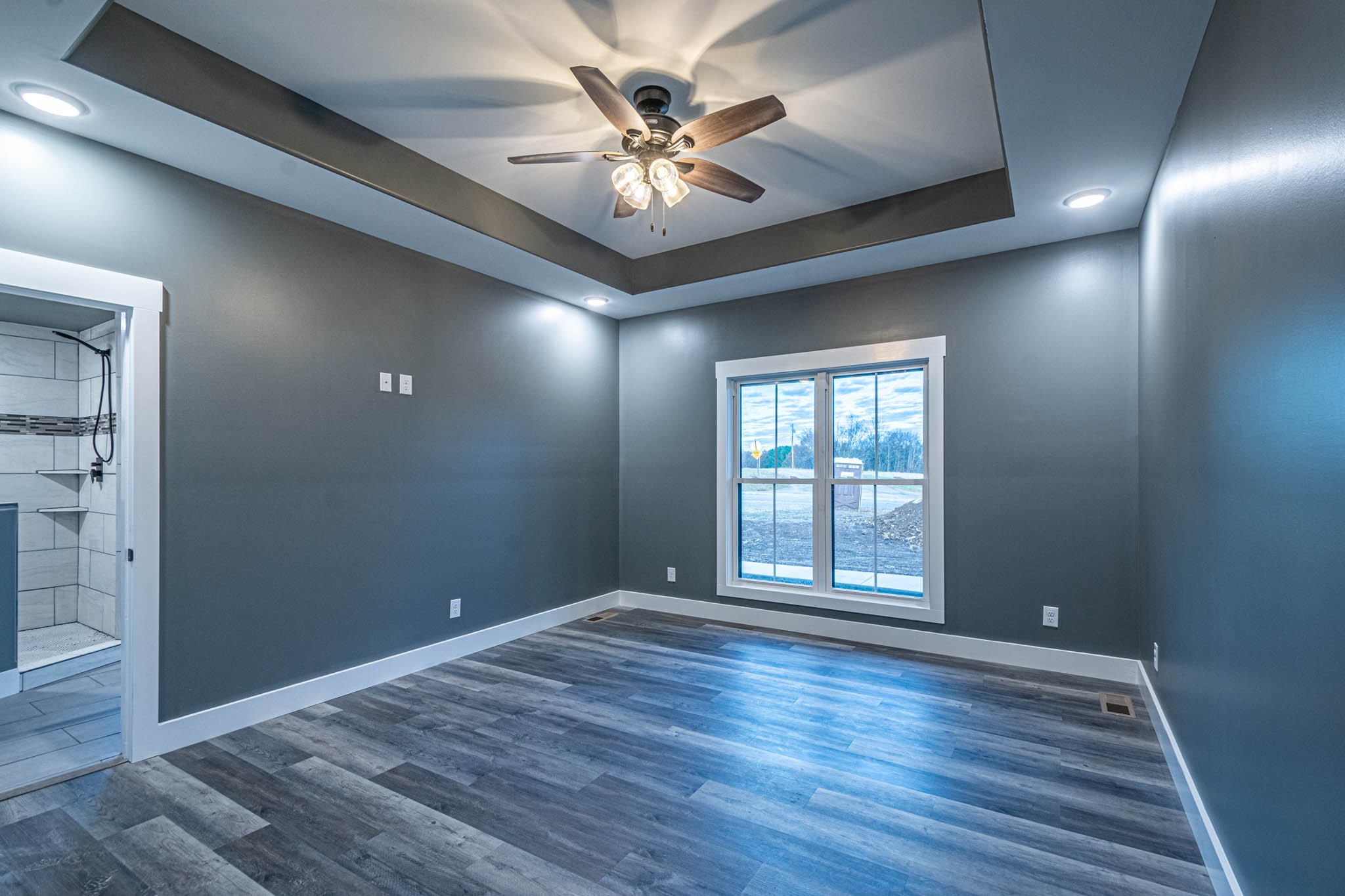 476 Chestnut Grove Road Pulaski, TN 38478 - Photo 26 of 55 a view of an empty room with window and wooden floor