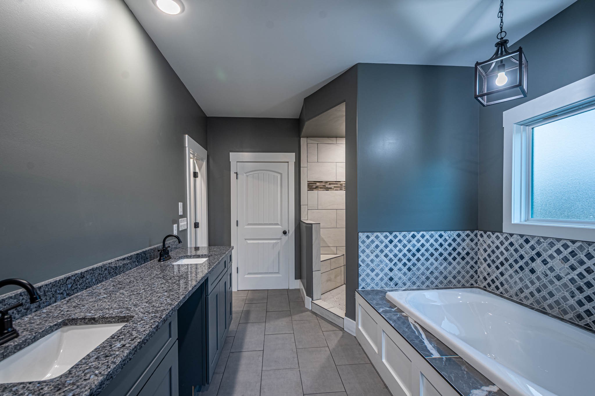 476 Chestnut Grove Road Pulaski, TN 38478 - Photo 32 of 55 a bathroom with a granite countertop sink and a bathtub