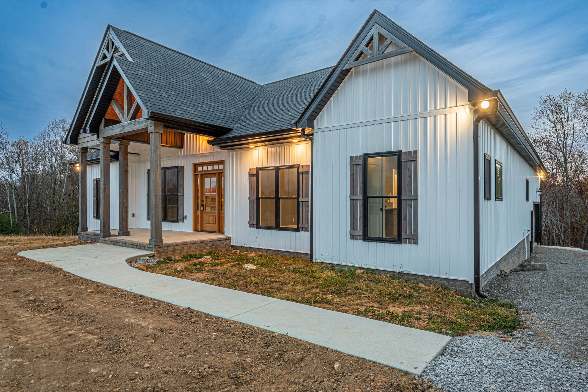 476 Chestnut Grove Road Pulaski, TN 38478 - Photo 54 of 55 a front view of a house with garden