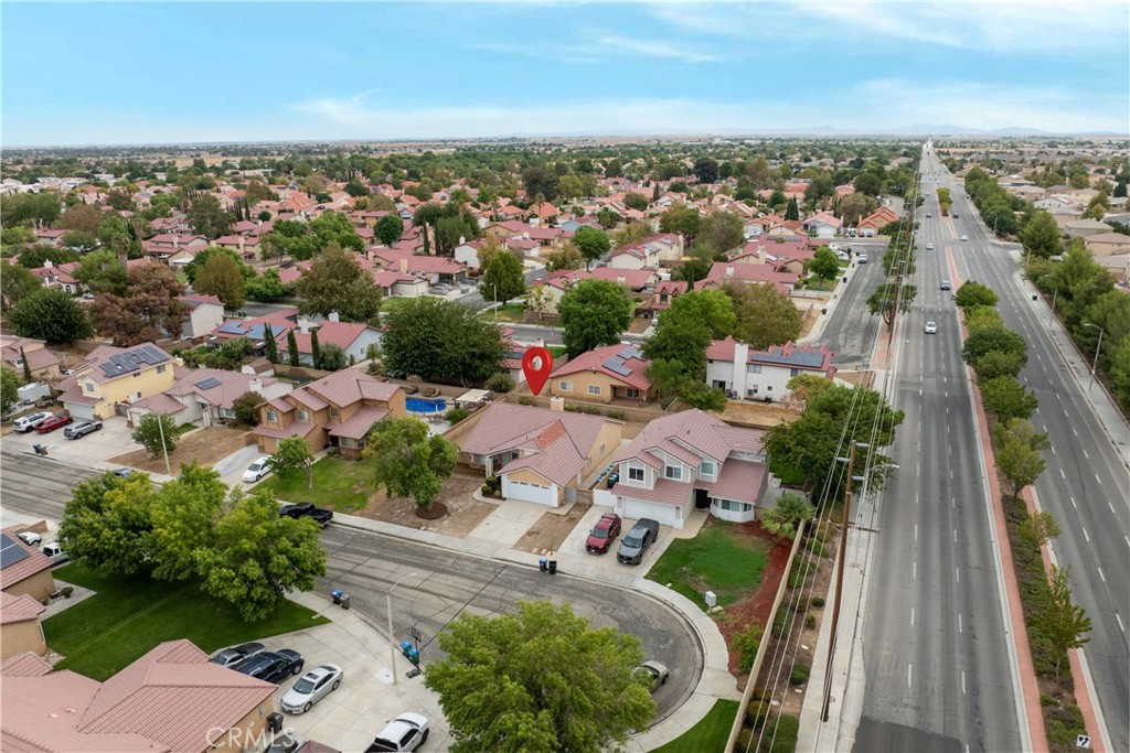 43610 16th Street East Lancaster, CA 93535 - Photo 17 of 21 an aerial view of a city with lots of residential buildings