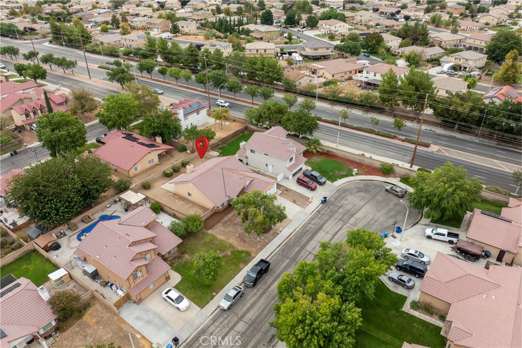 43610 16th Street East Lancaster, CA 93535 - Photo 18 of 21 an aerial view of a city with lots of residential buildings
