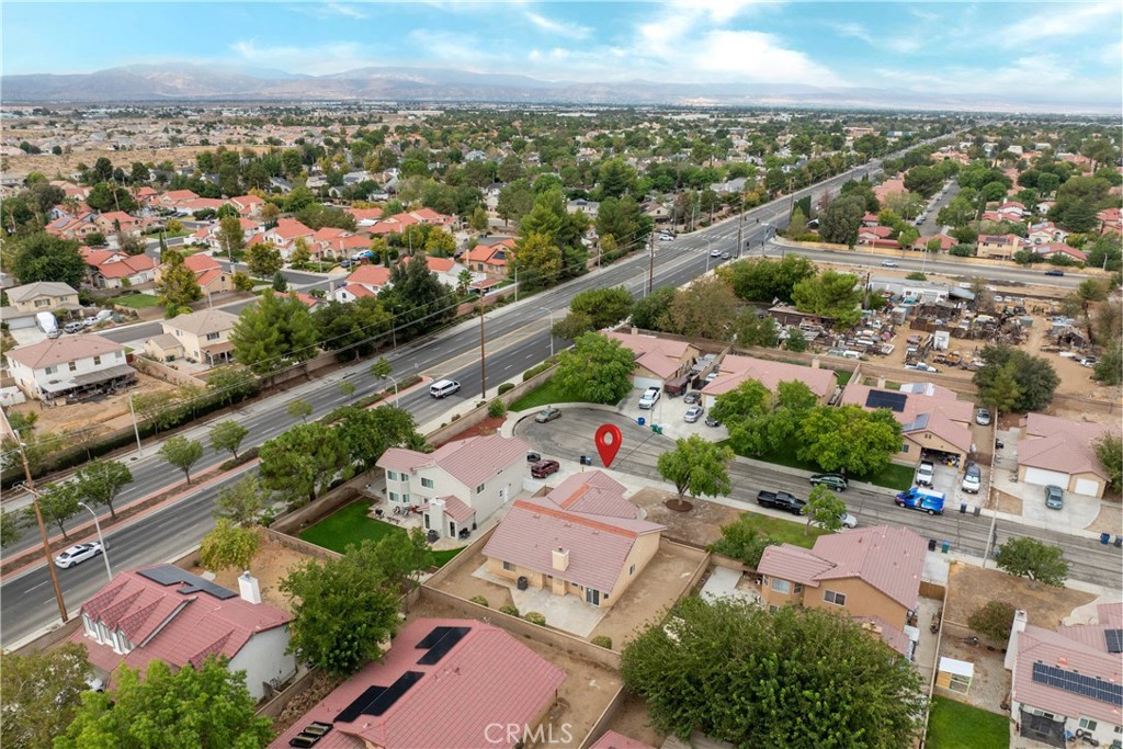 43610 16th Street East Lancaster, CA 93535 - Photo 19 of 21 an aerial view of residential houses with outdoor space