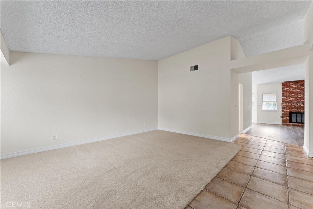 43610 16th Street East Lancaster, CA 93535 - Photo 3 of 21 a view of an empty room and window