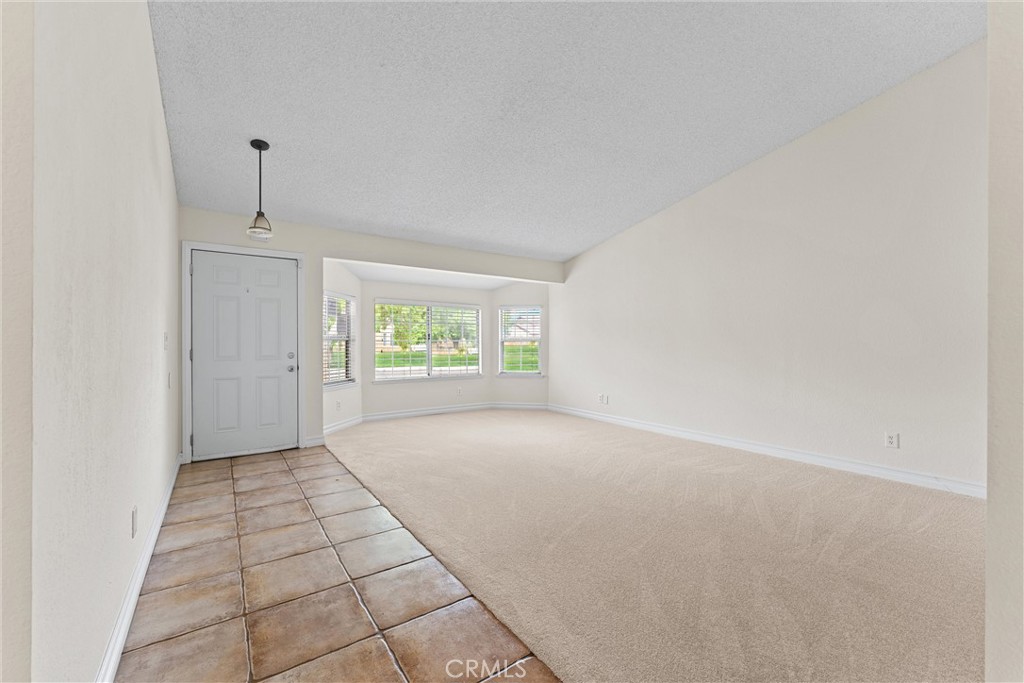 43610 16th Street East Lancaster, CA 93535 - Photo 4 of 21 an empty room with windows
