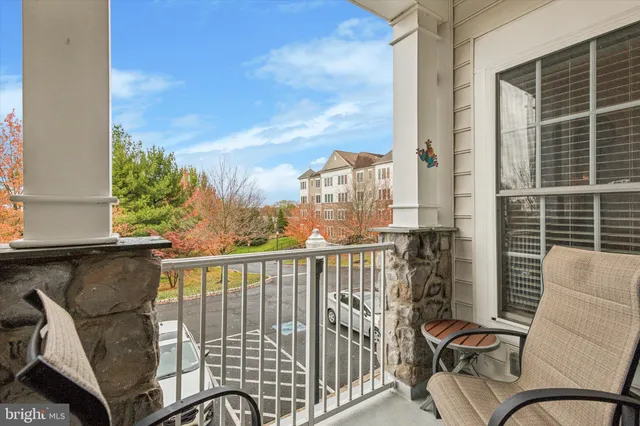 a view of balcony with furniture