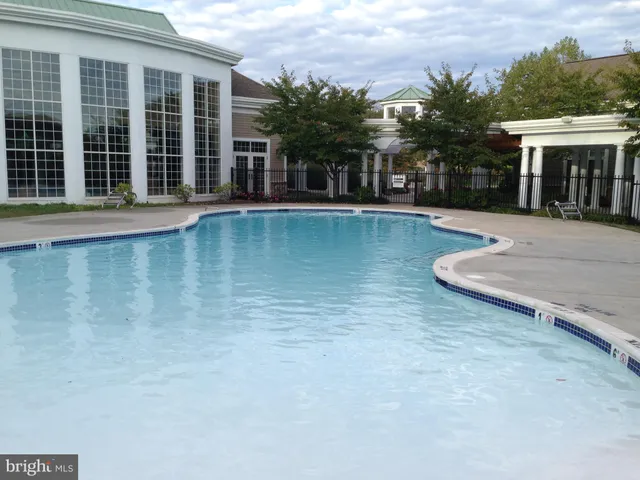 a view of a house with a swimming pool