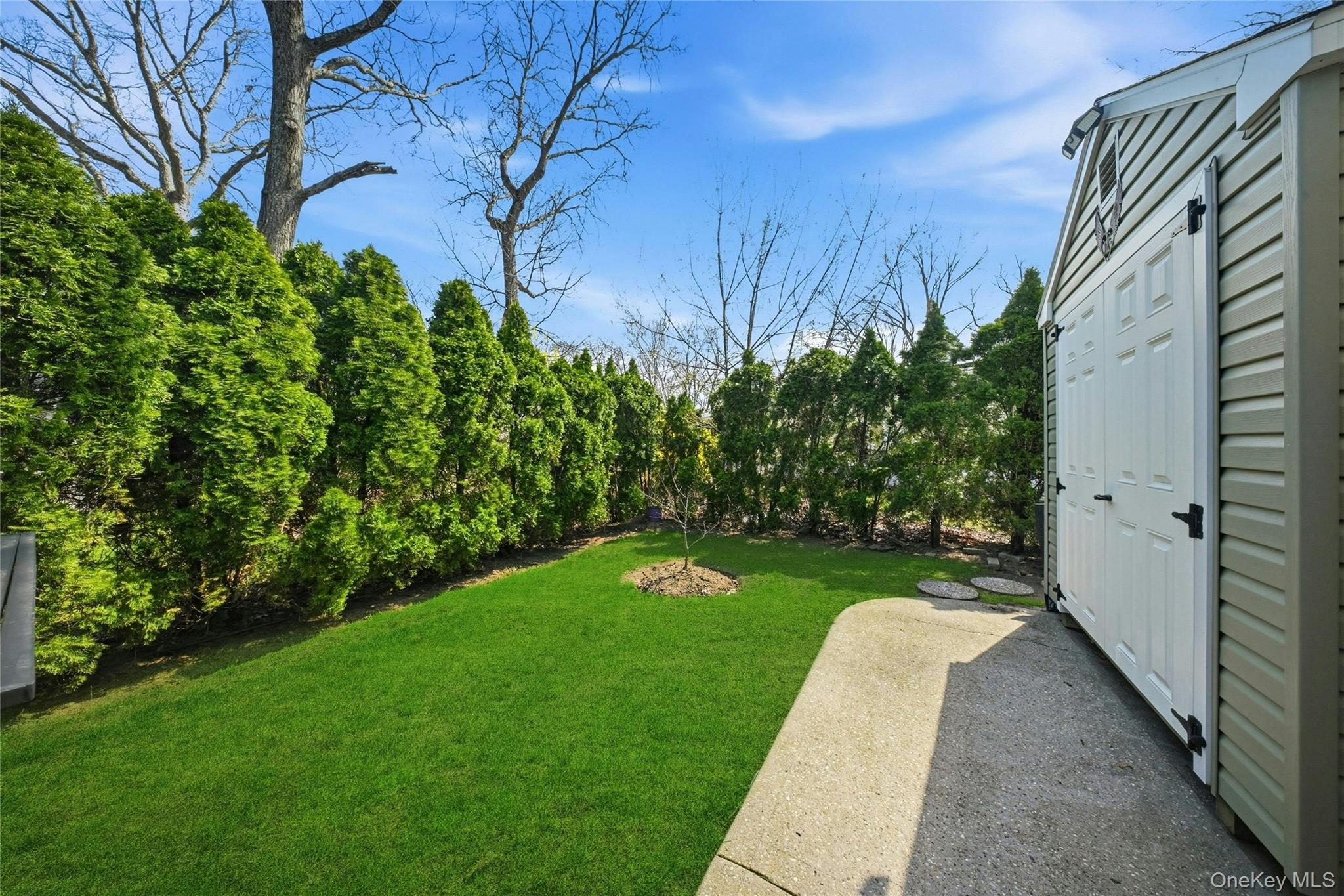 1661 Old Country Road, Unit 62 Riverhead, NY 11901 - Photo 33 of 36 Rear Yard & Shed