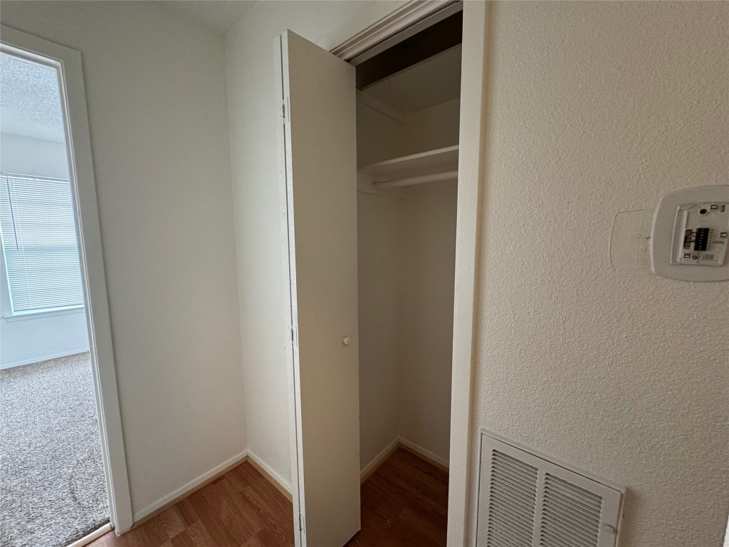 4810 West Wind Trail, Unit 104 Austin, TX 78745 - Photo 18 of 21 a view of walk in closet