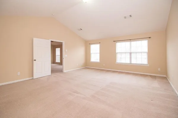 an empty room with windows