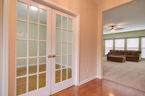 a view of living room with furniture and window