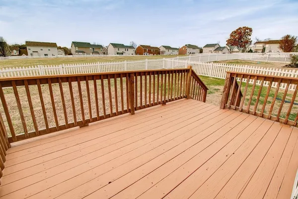 a view of balcony with furniture