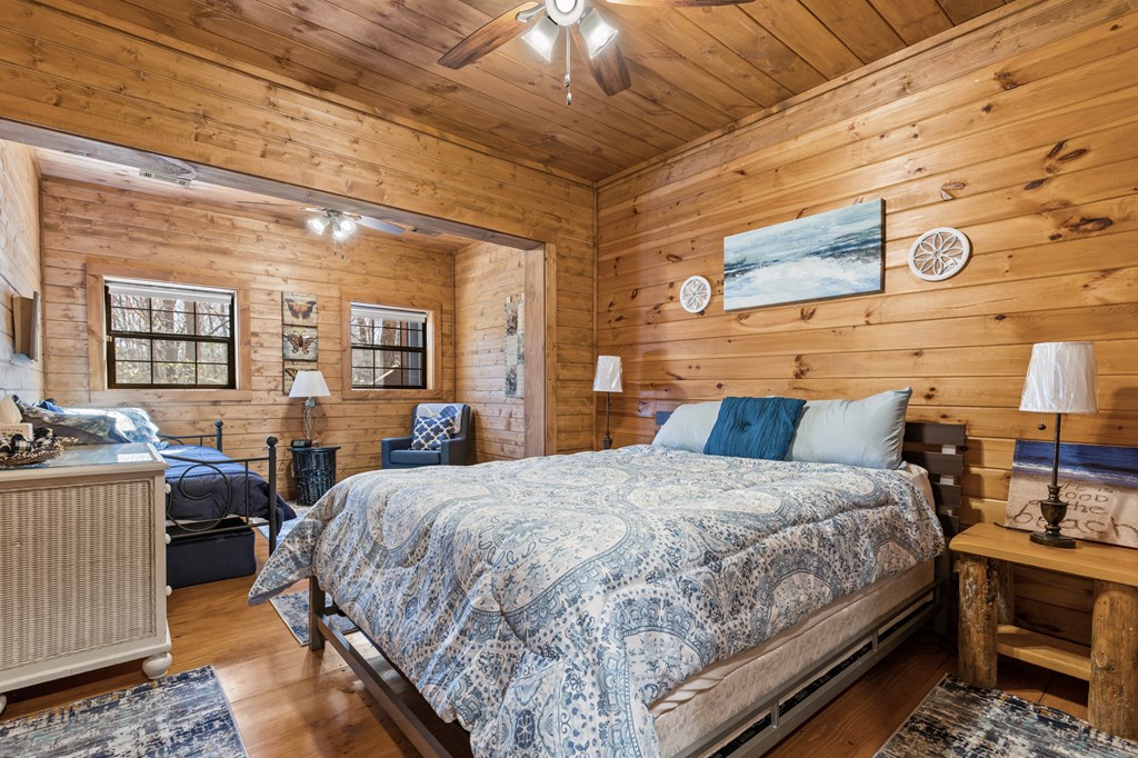 267 Granny Branch Drive Blue Ridge, GA 30513 - Photo 22 of 30 a bedroom with bed and window