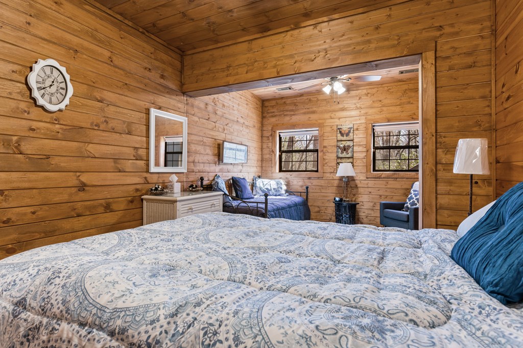 267 Granny Branch Drive Blue Ridge, GA 30513 - Photo 23 of 30 a large bedroom with a large bed and furniture