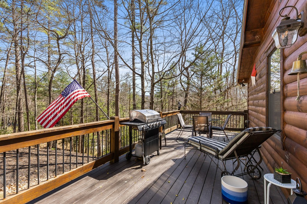 267 Granny Branch Drive Blue Ridge, GA 30513 - Photo 27 of 30 a view of balcony with wooden floor and outdoor seating