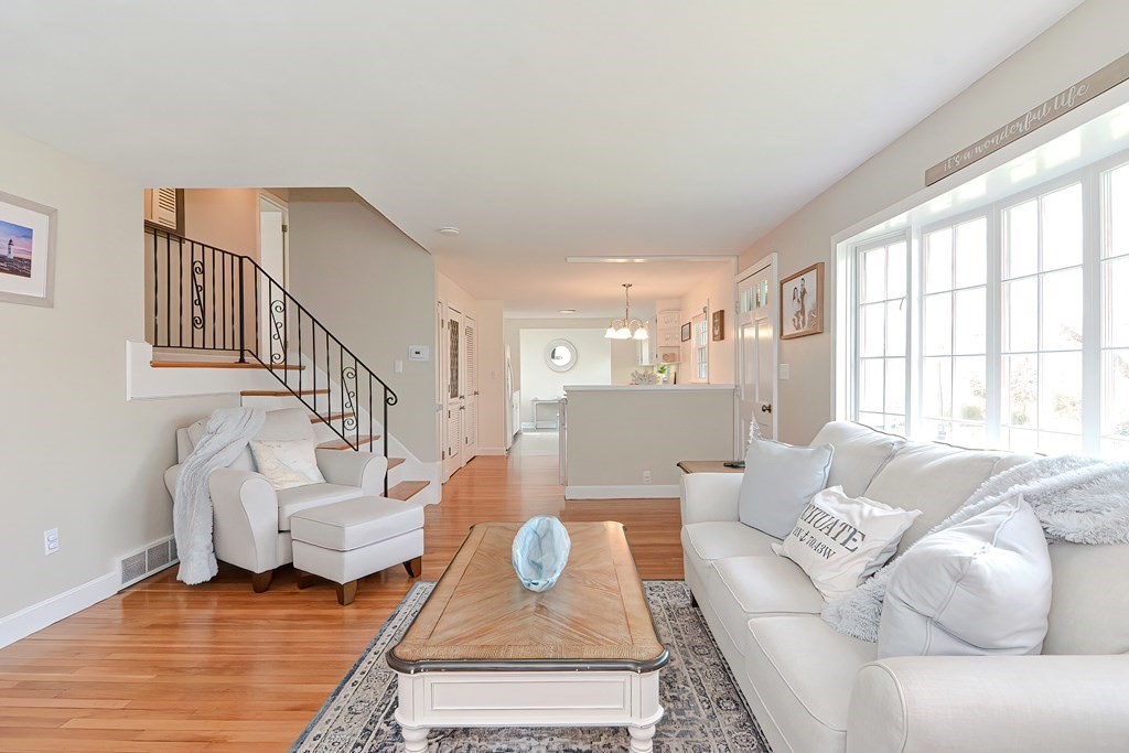 28 Tilden Road Scituate, MA 02066 - Photo 12 of 27 a living room with furniture or couch and a table