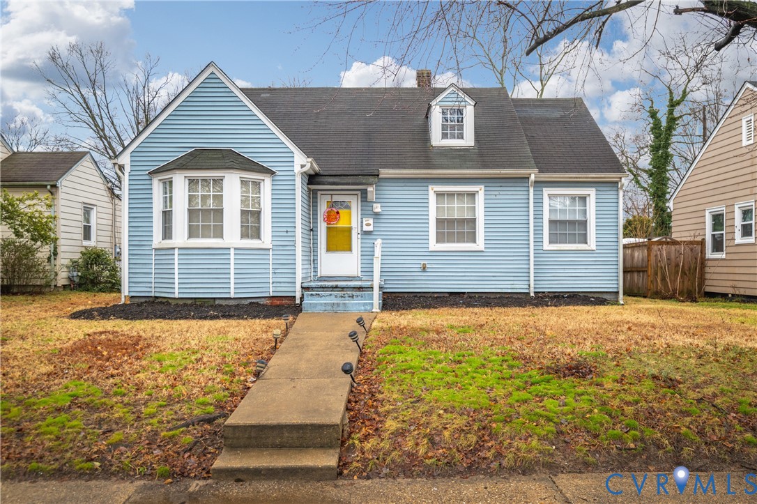 1311 Williamsburg Road Richmond, VA 23231 - Photo 1 of 38 Light blue siding exterior featuring a prominent b