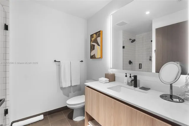 a view of a city with tall buildings