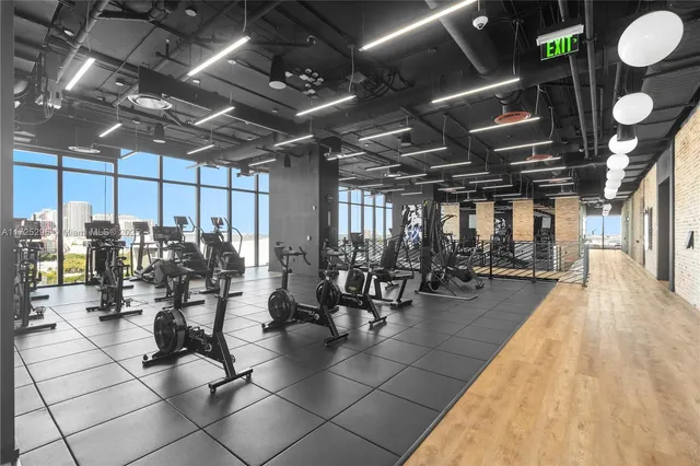 a view of a swimming pool with lawn chairs