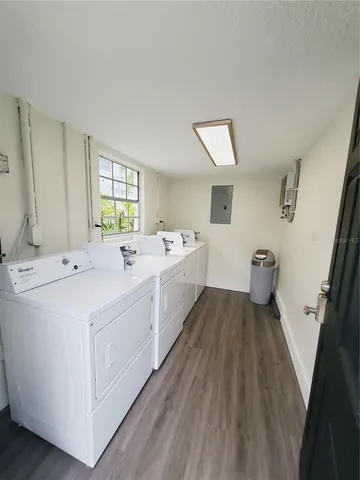 a spacious bathroom with a double vanity sink and mirror