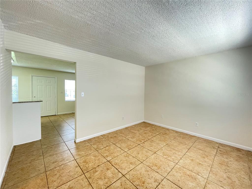 5254 Davisson Avenue, Unit 5254 Orlando, FL 32810 - Photo 9 of 15 wooden floor in a room