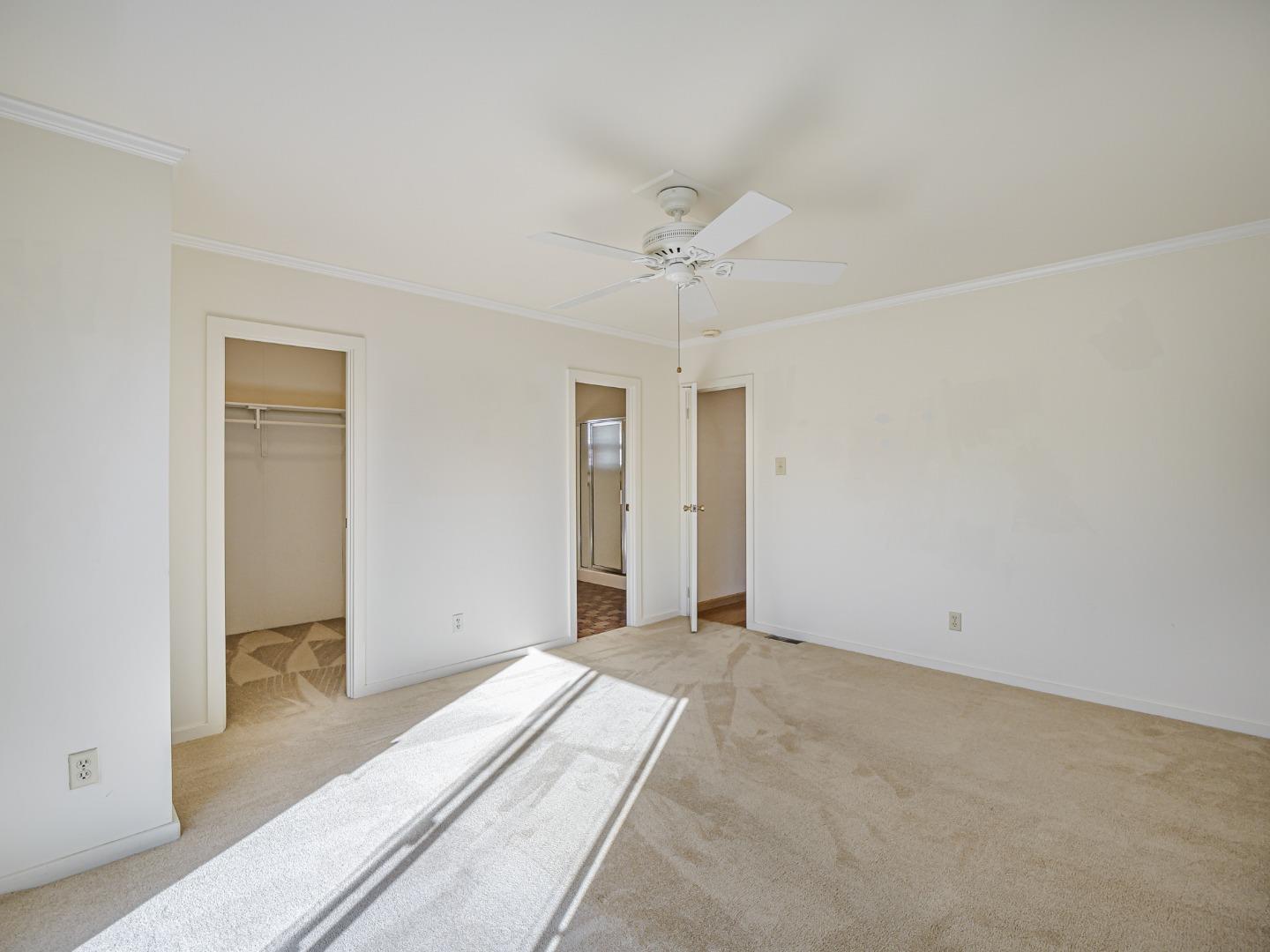 225 Mt Hermon Road, Unit 37 Scotts Valley, CA 95066 - Photo 15 of 44 a view of a room with a ceiling fan and a window