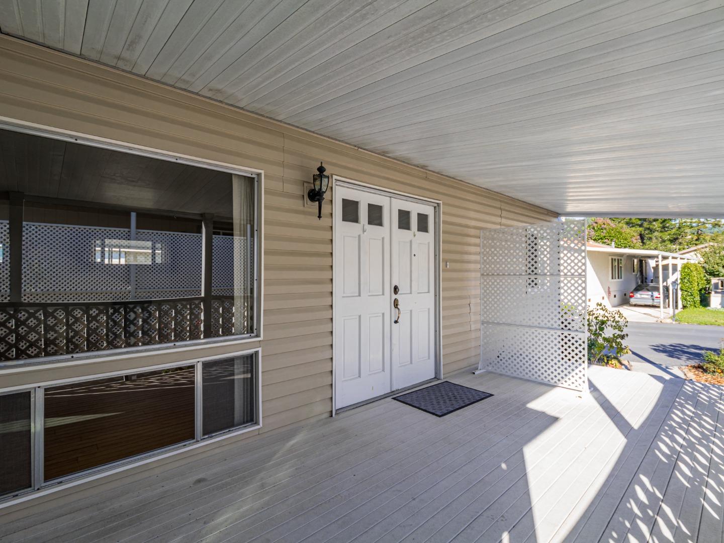 225 Mt Hermon Road, Unit 37 Scotts Valley, CA 95066 - Photo 25 of 44 a living room with stainless steel appliances wooden floor and a fireplace