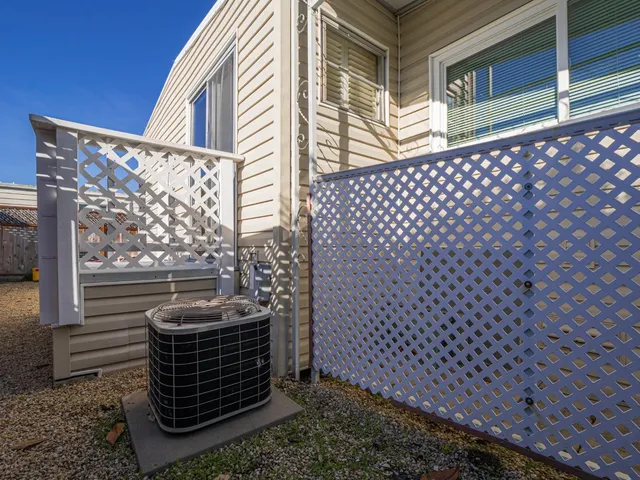 a view of a door and a window