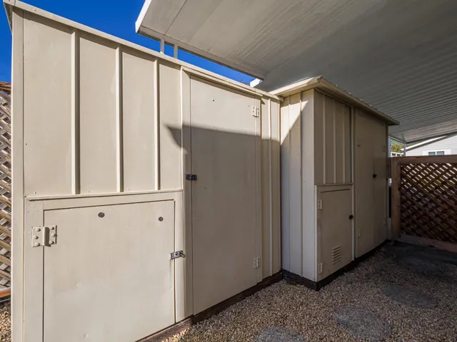 a view of a refrigerator in kitchen