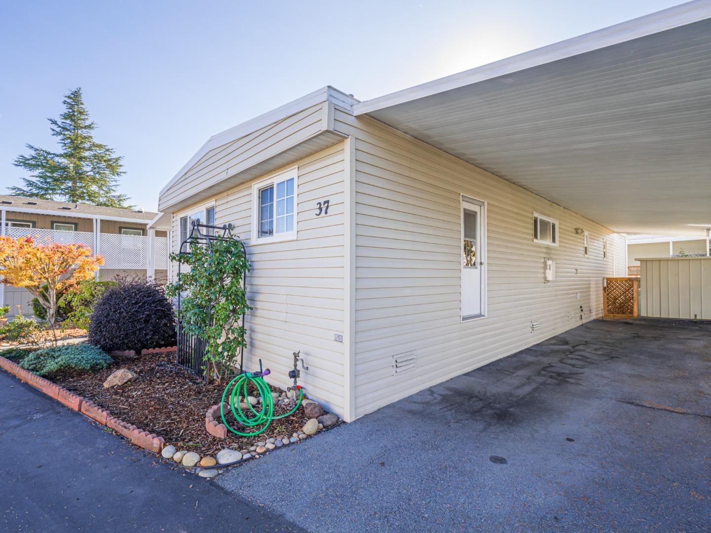 225 Mt Hermon Road, Unit 37 Scotts Valley, CA 95066 - Photo 34 of 44 a house with a yard and potted plants